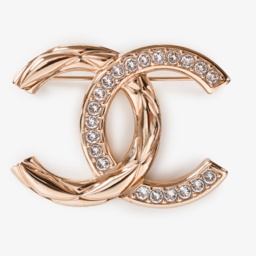 SOLD. Chanel brooche, gold and diamond.